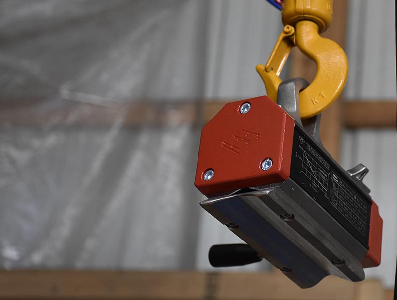 magnet and hook of a lift crane system